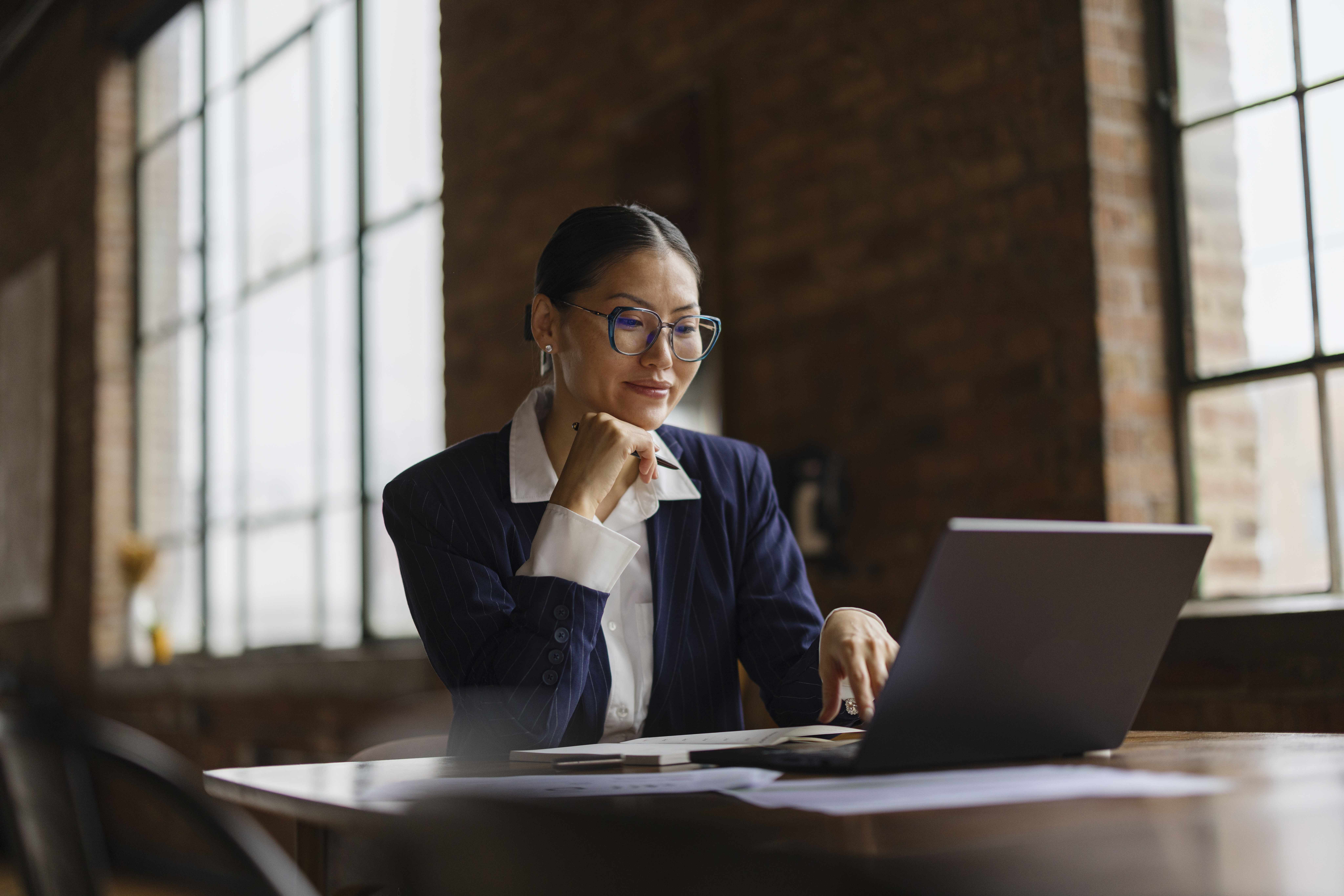 Woman working on laptop computer